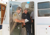 Ontario Conservation Officer Inspects Fishing Vessel